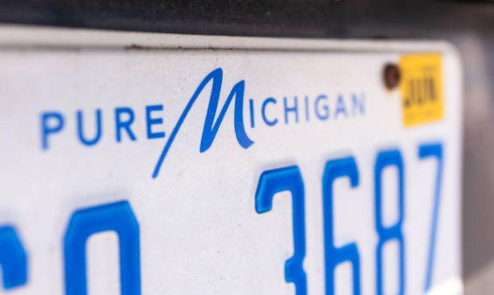 Close up picture of a standard Michigan license plate.