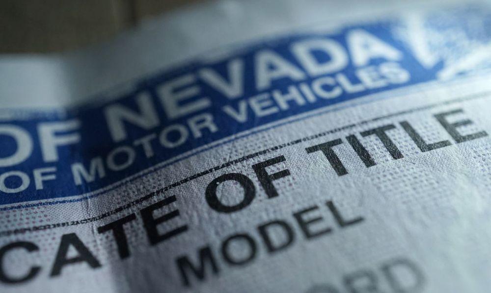 Close up shot of a Nevada car title.
