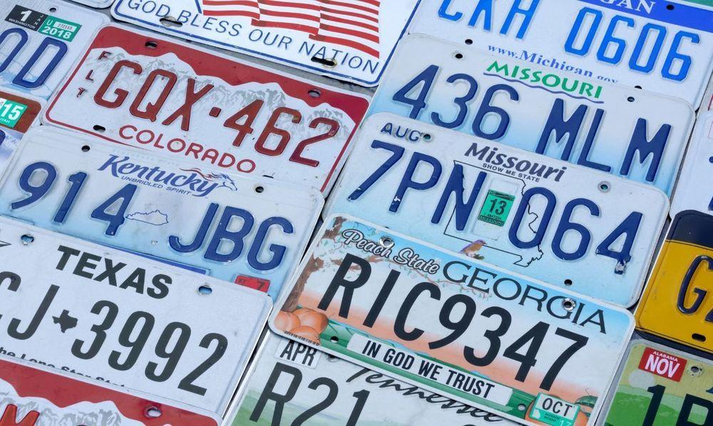 A lot of different United States license plates