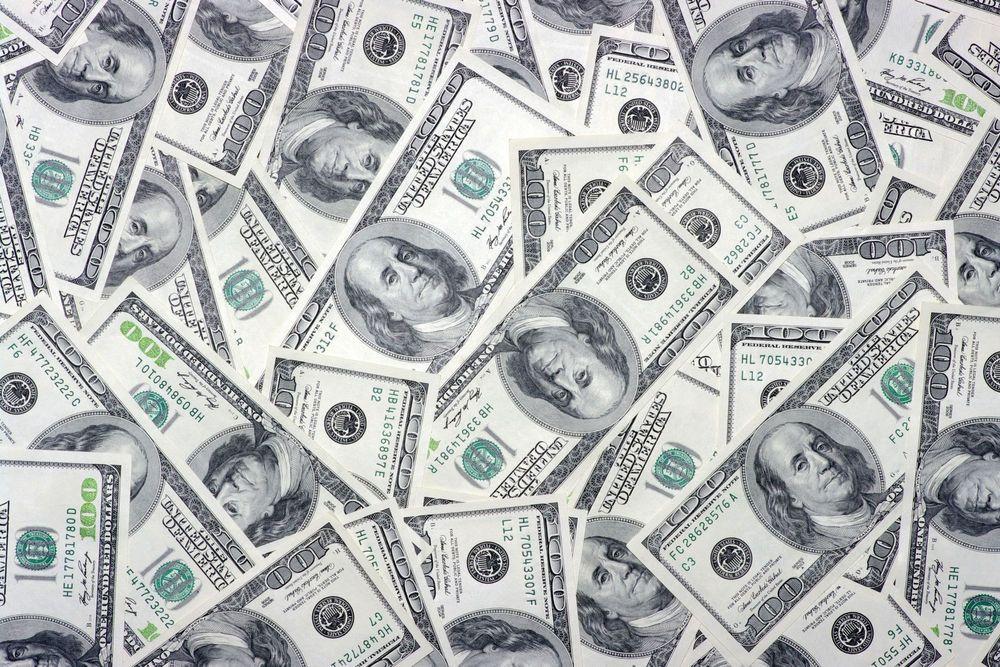 Pile of one-hundred dollar bills