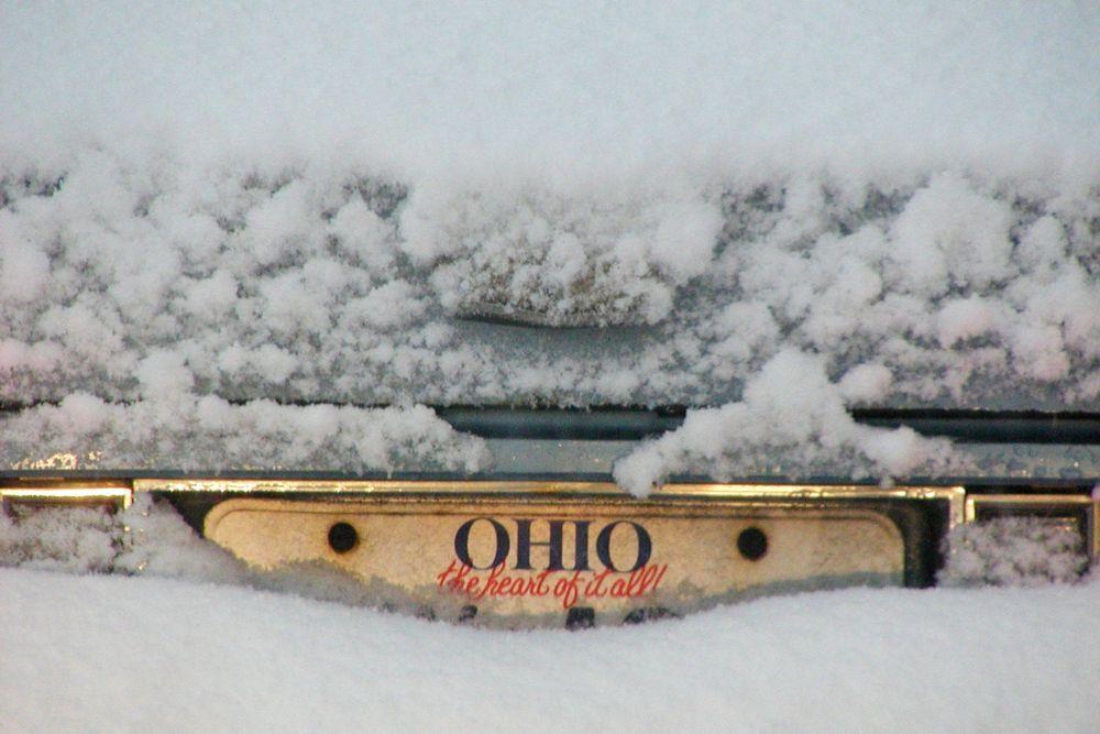 Ohio license plate buried in the snow