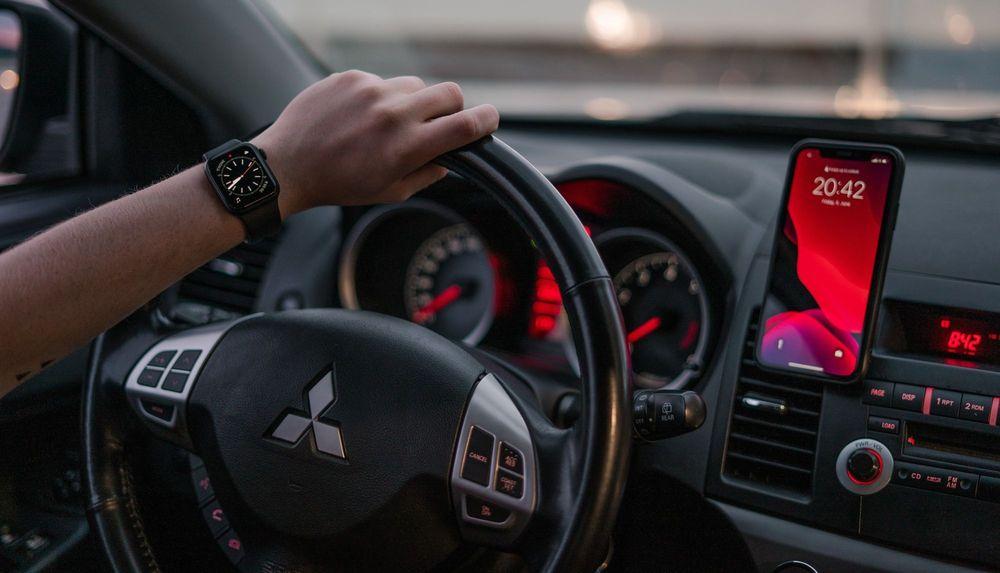 Mitsubishi logo on car steering wheel.