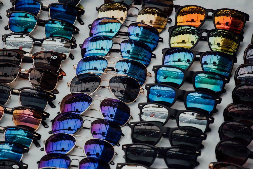 Sunglasses lined up in rows.