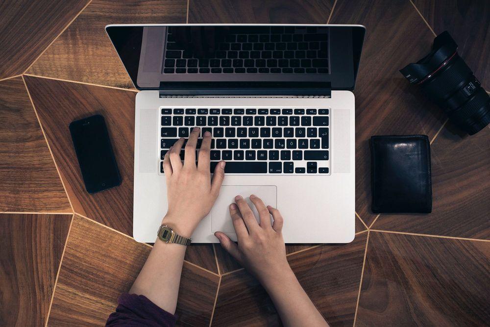 Person working on personal computer.