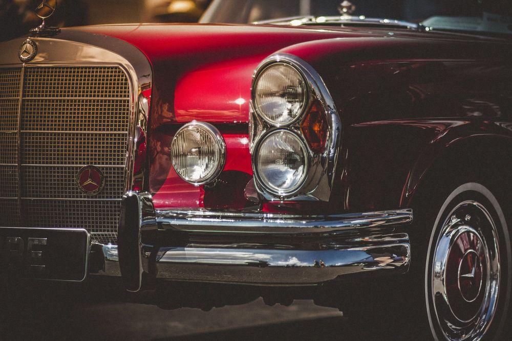 Close up shot of a red classic Mercedes 