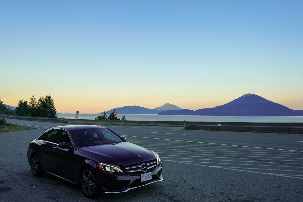 Mercedes parked on the side of the road.