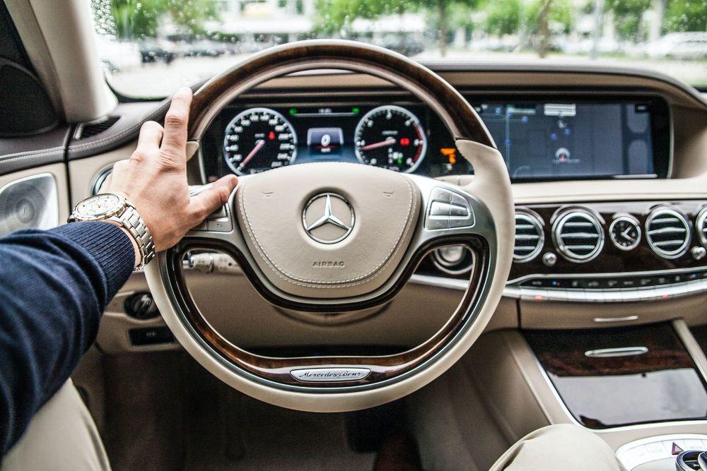 Guy behind the wheel of a Mercedes he just found on KSL and bought through PrivateAuto