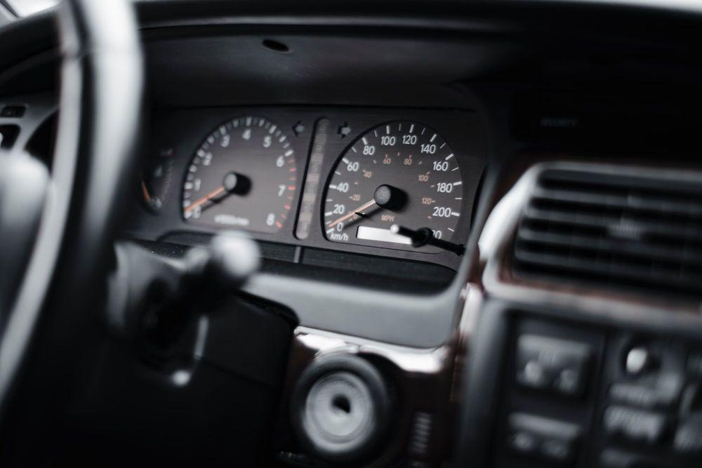 Dashboard of a vehicle showing the odometer 