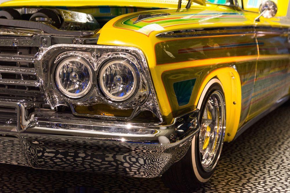 Front view of a yellow custom classic car