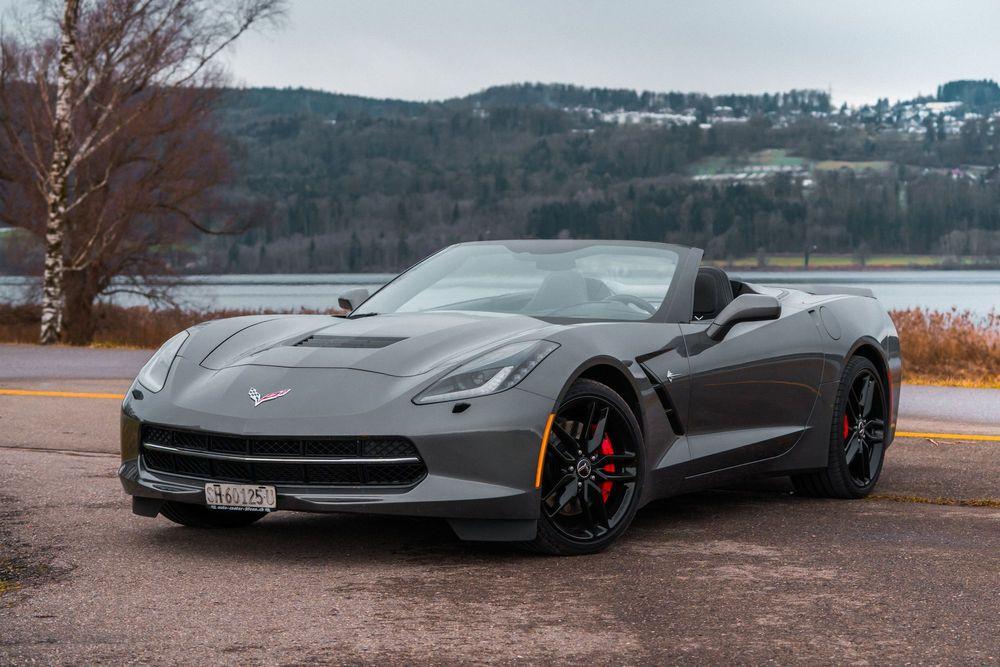 Gray Chevrolet Corvette parked on the side of the road